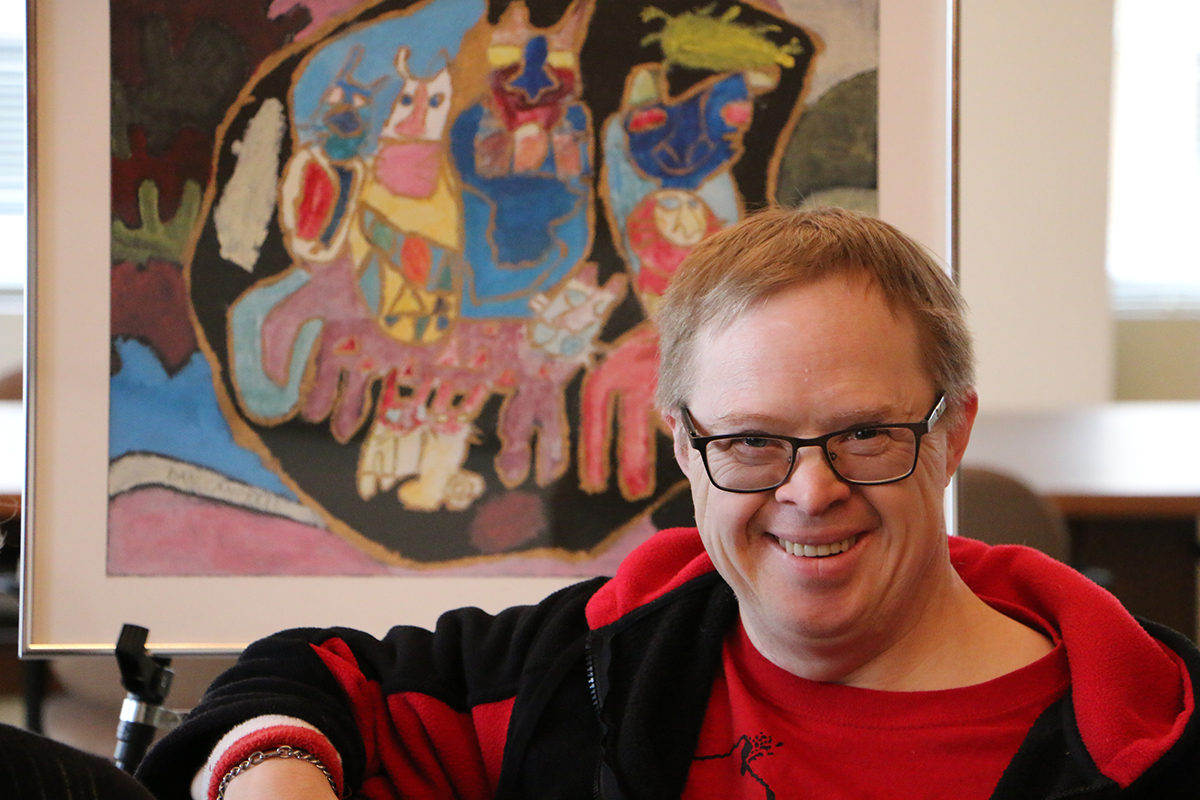 Dan Campbell with artwork