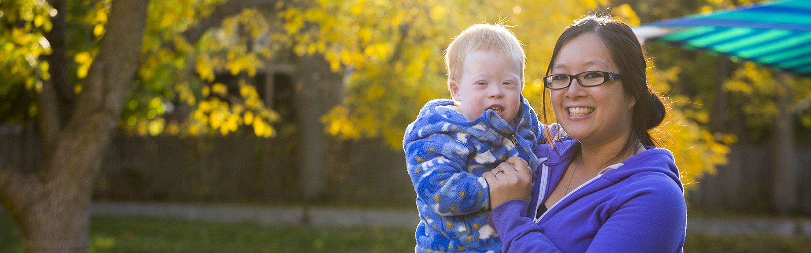 Friends hero - young man with down syndrome and early childhood teacher