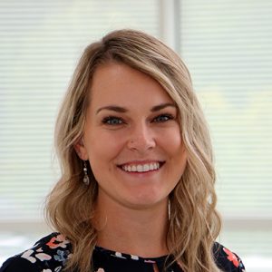 Woman with blonde hair smiling