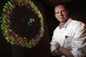 David Gamm with enlarged image of stem cell