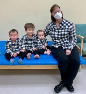 Brothers Joe, Teddy and Johnny with Peggy Modoff, Bone Dysplasia Clinic