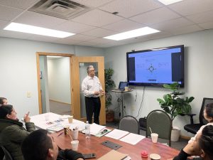 Portillo providing a workshop for parents with kids with disabilities on participating in decision making groups.