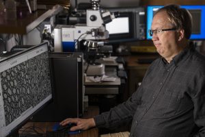 John Svaren, PhD, in his lab at the Waisman Center