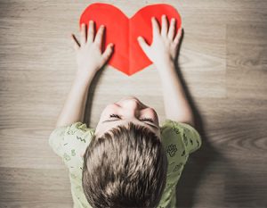 Child with heart valentine