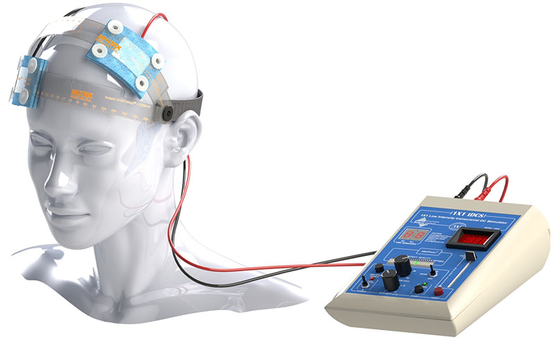 A manikin head wearing Transcranial Electrical Stimulation