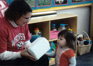 Lisa Marie with young student