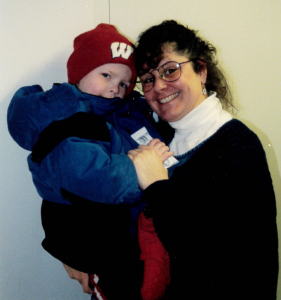 Lisa Marie and toddler with the Wisconsin "W" on his cap