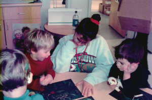 Lisa Marie Carilli-McCord and students discuss a problem
