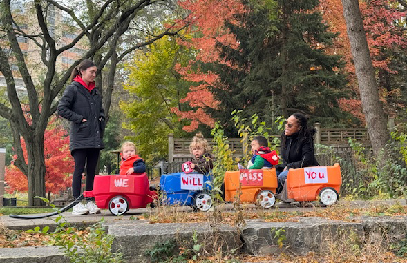 Children at WECP in wagons