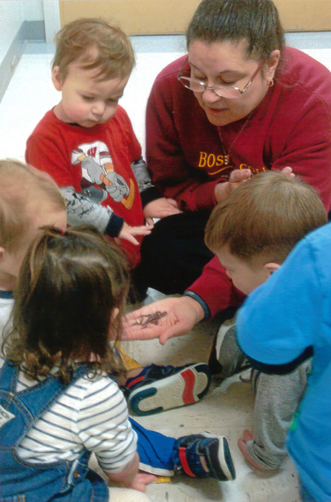 Lisa Marie Carilli-McCord with children in classroom